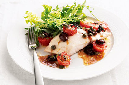 Baked fish with tomatoes, olives and capers