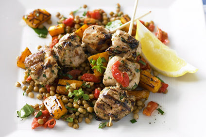 Lemon and garlic chicken skewers with lentil salad